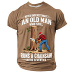 Never Underestimate An Old Man Who Runs A Chainsaw Graphic Mens T‑Shirt